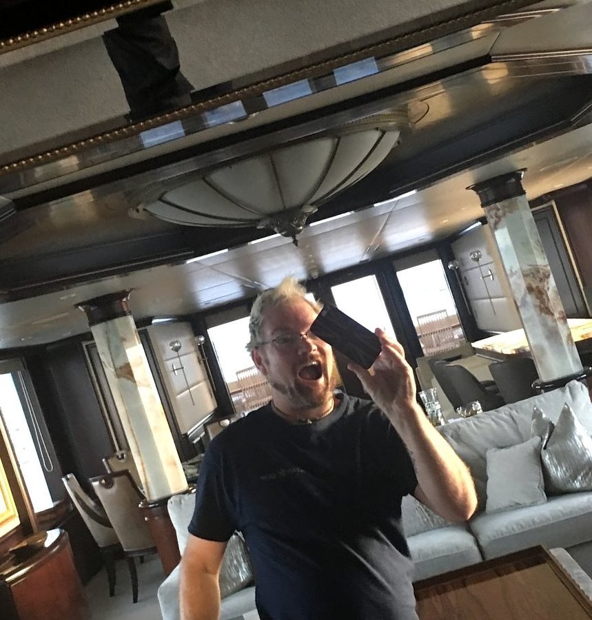 Mark in a superyacht saloon