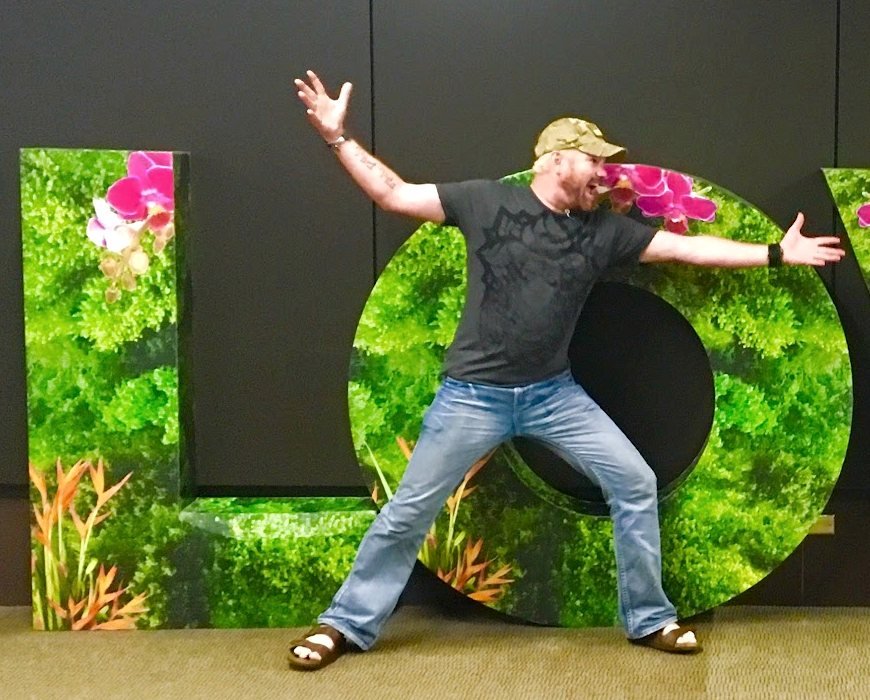 Mark posing at a giant LOVE sign